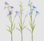 Trois campanules artificielles H70 en plastique, avec feuilles vertes, en blanc, bleu et violet.