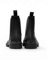 Dos des Bottes de pluie Chelsea noires en caoutchouc naturel avec doublure textile, élastique latéral et semelle crantée assortie