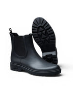 Semelle des Bottes de pluie Chelsea noires en caoutchouc naturel avec doublure textile, élastique latéral et semelle crantée assortie