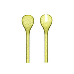 Couverts à salade Memento Synth en plexi jaune vibrant, avec bulles d'air emprisonnées.