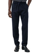 Pantalon droit en flanelle de laine recyclée bleu marine pour homme avec ceinture élastiquée à cordon de serrage, modèle Joggy de la marque Hartford.
