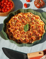 Le formidable plat a tarte vert fougere cookut 29cm en metal recycle avec coupe tarte.