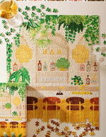 Détail du Puzzle 1000 pieces bar jungle urbaine botanique avec plantes et bouteilles marque All The Ways To Say
