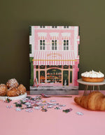Ambiance déco avec le Puzzle 1000 pieces pink bakery patisserie parisienne rose pastel avec gateaux marque All The Ways To Say.
