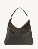 Dos du Sac hobo pour femme en cuir de vachette tressé marron chocolat avec pompon assorti, modèle Sharon de LOXWOOD. Porté épaule avec fermeture zippée.