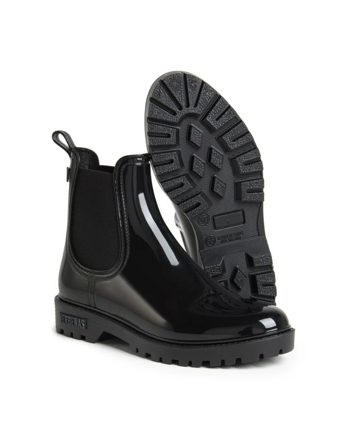 Bottines de pluie Chelsea Gaudi Verbenas noires brillantes avec semelle crantée.