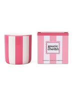 Bougie parfumée d'intérieur Chichou de la marque Opjet, présentée dans un contenant cylindrique en céramique blanche de 8 cm de hauteur avec de délicates rayures horizontales rose poudré peintes à la main