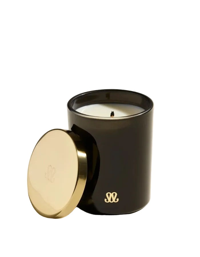 Bougie Stella Ambre Noire 200g Maison Sarah Lavoine, verre noir monogrammé et couvercle doré.