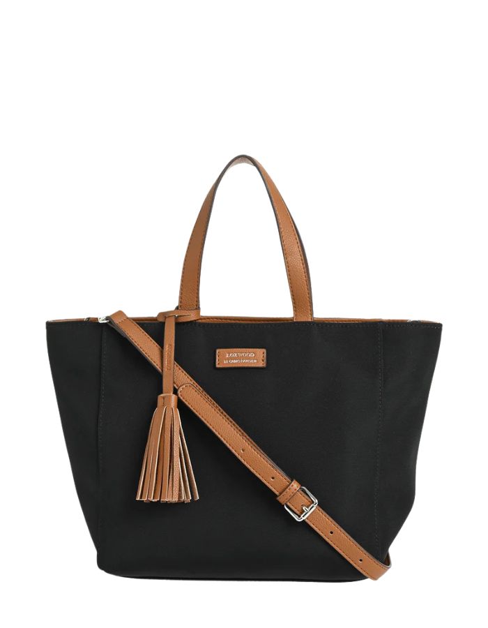 Sac cabas zippé pour femme en nylon satiné noir avec bandoulière amovible, modèle Cabas Parisien Zippé de la marque LOXWOOD. Présente des anses de porté main, un pompon décoratif et des finitions simili-cuir