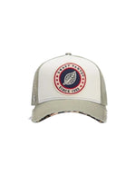 Casquette trucker bicolore Sweet Pants Home Run Leo Sage avec patch logo et visière effet destroy.