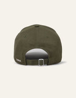 Dos de la Casquette pour femme de couleur kaki uni, modèle Heloa de la marque Ba&sh. Confectionnée en coton bio, elle présente une visière classique courbée, le logo de la marque brodé en relief sur le devant et une patte de serrage ajustable à l'arrière.