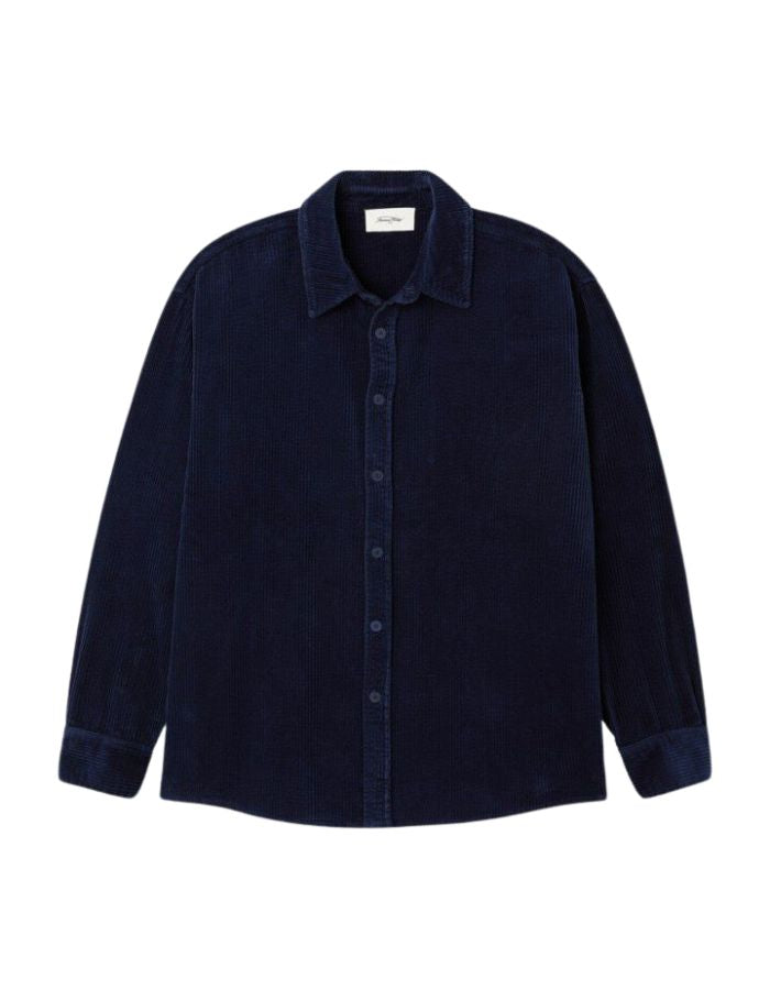 Chemise ample pour homme en velours côtelé bleu marine délavé avec col classique et manches longues, modèle Padow couleur Navy Vintage de la marque American Vintage.