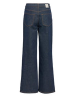 Dos du Jean large taille mi-haute pour femme en denim bleu foncé rincé, modèle Rio Mae Wide Jeans de la marque OBJECT. Présente une coupe wide leg 5 poches avec fermeture boutonnée et zippée.