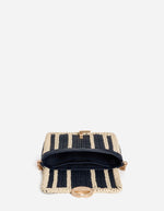 Petit sac Moon Vanessa Bruno marine et crème en cuir tressé, avec fermoir doré et chaîne.