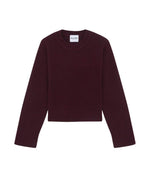 Pull oversize col rond pour femme en cachemire épais 10 fils bordeaux, modèle Pauly de la marque KUJTEN. Présente une coupe ample légèrement courte avec des épaules descendues et des finitions en bord-côte.