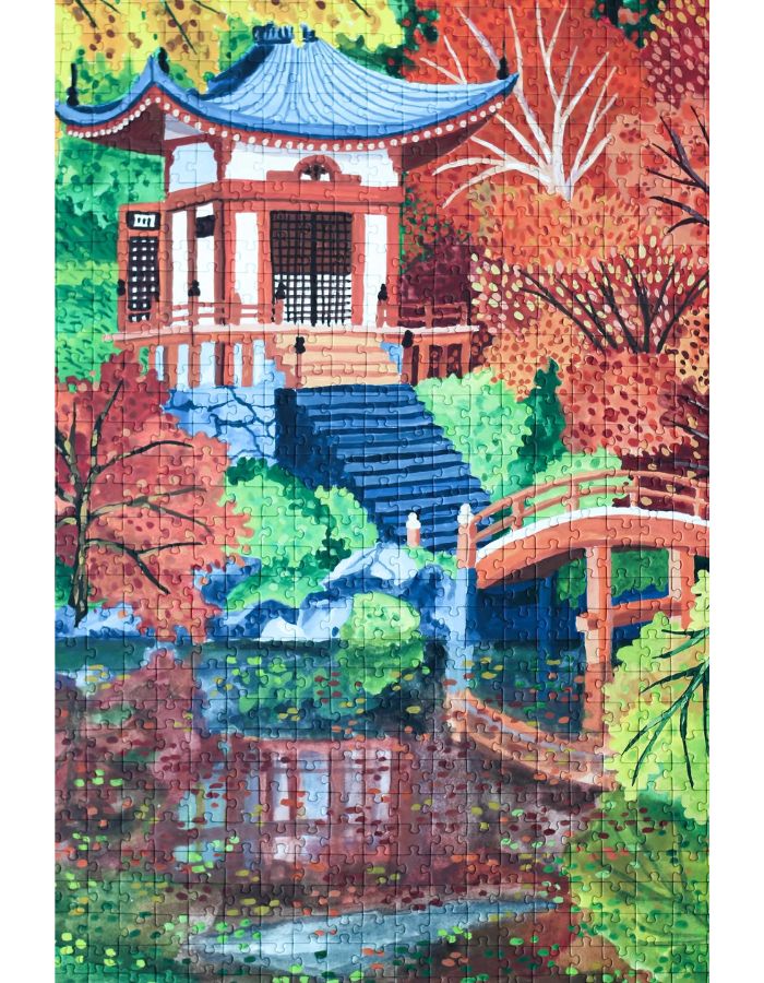Vue du puzzle 1000 pièces Kyoto Temple par Piecely. L'illustration représente le célèbre temple japonais Daigo-ji entouré d'arbres aux couleurs flamboyantes de l'automne se reflétant sur l'eau, dans un style graphique épuré et apaisant.
