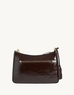 Dos du Sac porté épaule pour femme en cuir de vachette vernis bordeaux, modèle Sam de la marque LOXWOOD. Présente une forme compacte zippée sur le dessus et une anse réglable.