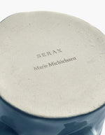Signature sur l'ensemble de 3 petits vases en céramique émaillée aux teintes bleu canard, corail et jaune moutarde aux motifs sculptés variés