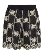 Dos du Short taille haute fluide Nala par Rouge Edit, coloris noir Meteorite Embroidery. Coupe large avec poches latérales et broderies ton sur ton élégantes. Tissu soyeux en mélange de lyocell.