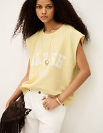 Sweat Beata Jaune Ba&sh sans manches en coton biologique avec logo blanc et encolure ronde.