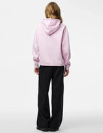 Vue de dos du Sweatshirt à capuche uni pour femme modèle Chilli de la marque Pieces. Coupe droite de couleur violet mauve pastel Winsome Orchid, doté de manches longues et de finitions élastiques aux poignets