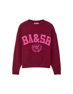 Sweatshirt pour femme en coton biologique rose, modèle Benjamin de la marque ba&sh. Présente une coupe confortable confectionnée au Portugal.