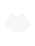 T-shirt Davina blanc cassé en coton organique, coupe droite ample, manches courtes larges et col bateau.