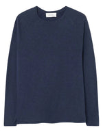 T-shirt à manches longues pour homme de couleur blanc uni, modèle Sonoma de la marque American Vintage. Présente une coupe droite en coton flammé épais texturé avec un col rond et des manches de style raglan.