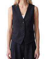 Veste sans manches pour femme coupe tailleur bleu marine avec décolleté en V et poches latérales, modèle Veste Evelia couleur Navy de la marque ARTLOVE.