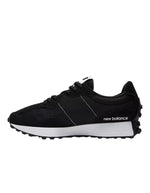 Côté des Baskets sneakers noires et blanches new balance 327 logo n surdimensionne daim et mesh semelle crampons