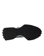 Semelles des Baskets sneakers noires et blanches new balance 327 logo n surdimensionne daim et mesh semelle crampons