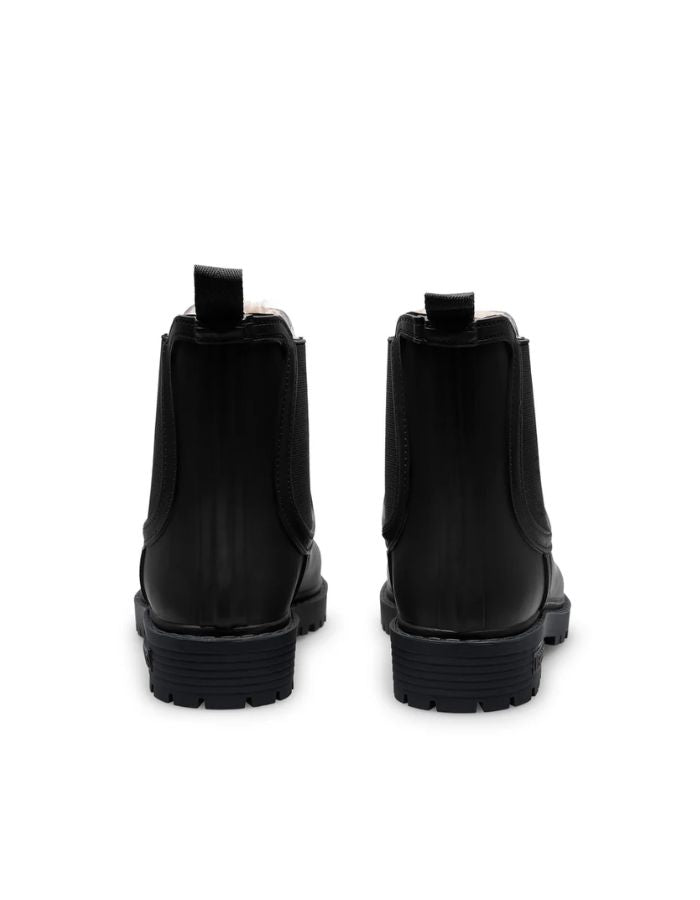 Dos des Bottes de pluie Chelsea noires en caoutchouc naturel avec doublure en fausse fourrure, élastique latéral et semelle crantée
