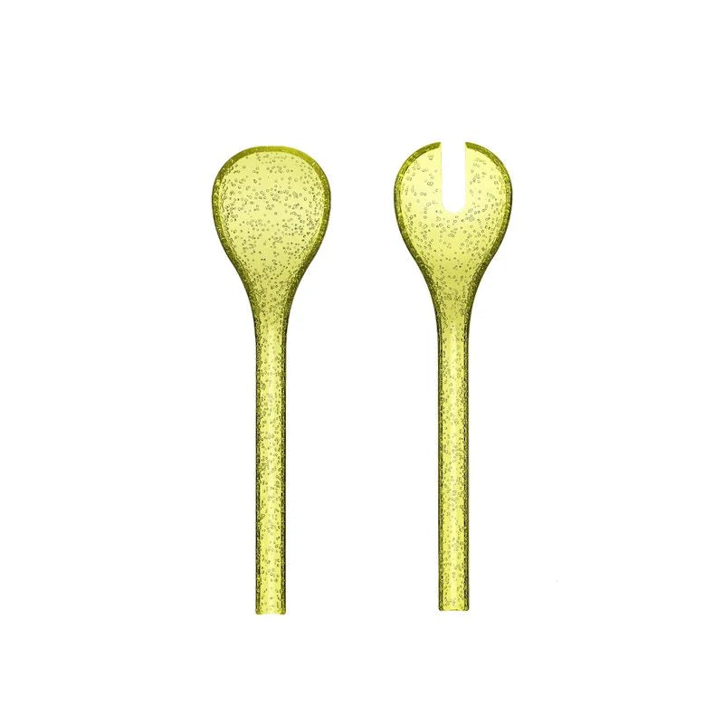 Couverts à salade Memento Synth en plexi jaune vibrant, avec bulles d'air emprisonnées.