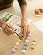 Réalisation avec le Kit de peinture au numero bakery patisserie rose et dalmatien avec peinture biosourcee marque All The Ways To Say