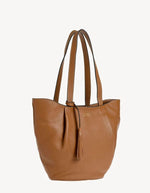 Profil du Grand sac cabas porte epaule brandy cognac alma loxwood cuir graine pompon fermeture zippee