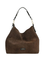 Sac hobo pour femme en cuir velours marron chocolat avec pompon assorti et porté épaule, modèle Sharon de la marque Loxwood.