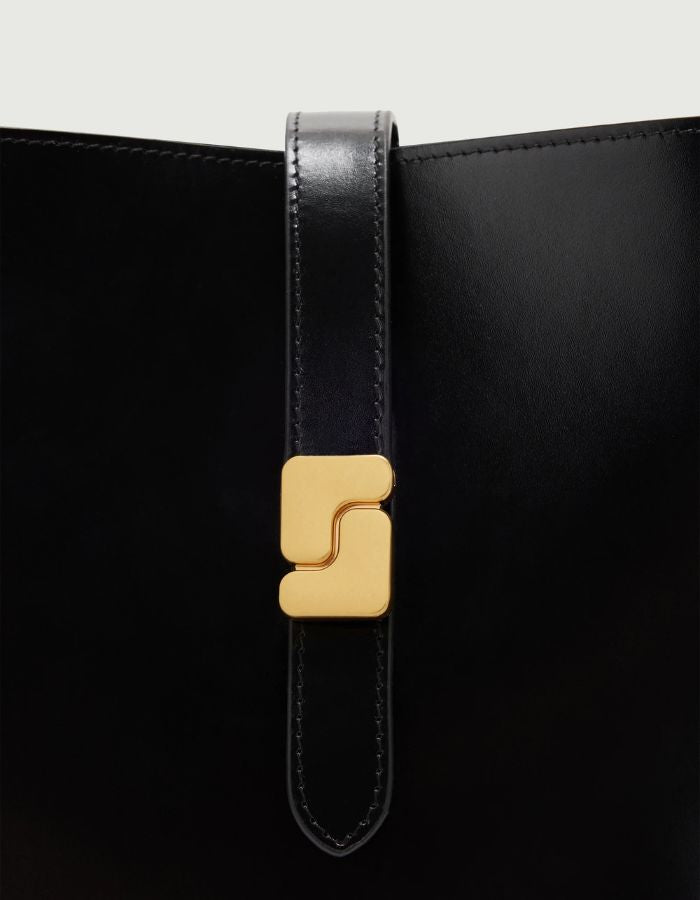 Attache du Petit sac seau noir en cuir box bello mini soeur boucle s doree ferme bouton pression