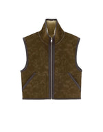 Veste courte sans manches réversible pour femme en sherpa beige et nubuck marron avec col montant et détails de coutures façon cuir, modèle Jonson de la marque Bellerose.