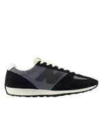 Baskets basses rétro pour homme en mesh et daim gris castlerock avec logo N noir, découpe fang sur l'avant-pied et semelle EVA, modèle 471 de la marque New Balance.