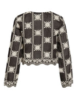 Dos de la Blouse noire à manches longues Nala par Rouge Edit en coloris Meteorite Embroidery. Col en V avec broderies délicates et liens à nouer sur le devant. Tissu fluide et élégant en lyocell et polyester