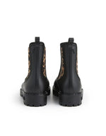 Talons des Bottines de pluie pour femme en PVC noir mat avec élastique latéral imprimé léopard et semelle crantée, modèle Gaudi Mate Animal Negro-Leopardo de VERBENAS.