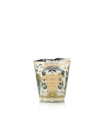 Bougie parfumée Baobab Collection Tomorrowland 2026, verre décoré d'illustrations dorées et bleues.