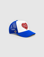 Profil de la Casquette trucker bicolore bleu électrique pour homme et femme avec patch cœur en feutrine brodée et filet à l'arrière, modèle Heart Foam Cap couleur Electrik de la marque Sweet Pants.