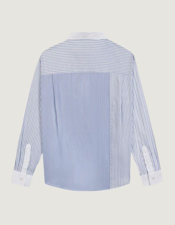 Dos de la Chemise ample pour homme en popeline de coton à motifs patchwork, modèle Breteuil Patchwork de la marque Maison Labiche. Présente une coupe droite large avec col chemise, boutons gravés et une broderie discrète à l'arrière du col.