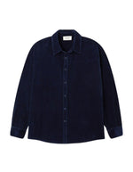 Chemise ample pour homme en velours côtelé bleu marine délavé avec col classique et manches longues, modèle Padow couleur Navy Vintage de la marque American Vintage.