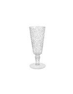 Flûte à champagne transparente en plexi avec bulles d'air incrustées, incassable et élégante.