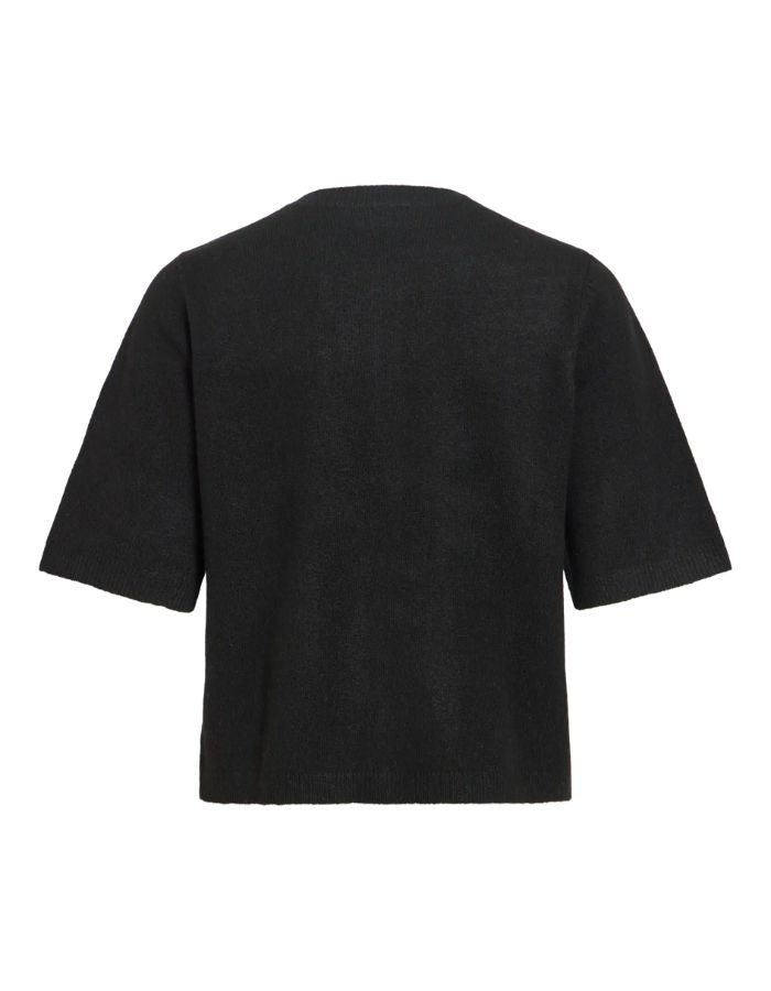 Dos du Gilet fin en maille pour femme de couleur noir uni Black Beauty, modèle Liga de la marque Vila. Présente un col rond, une fermeture par boutons sur le devant et des manches mi-longues arrivant sous le coude.