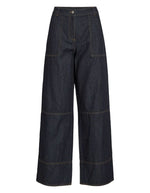 Jean coupe droite Brixton en denim bleu foncé avec surpiqûres contrastantes et taille mi-haute.