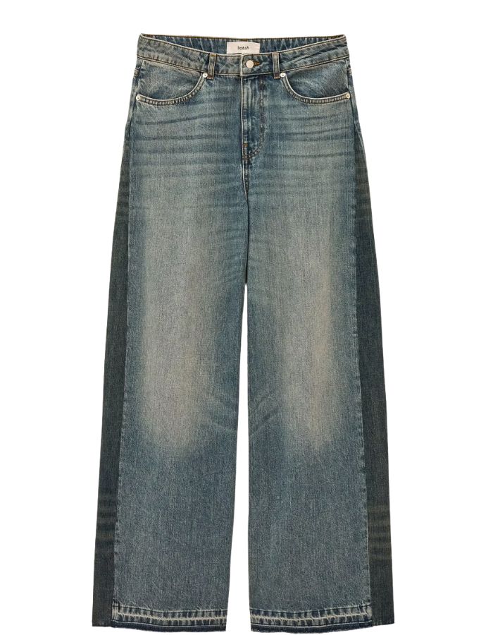 Jean large taille basse pour femme en coton bio bleu patiné effet vieilli et rapiécé avec bandes contrastées et bas coupé franc, modèle Mislav Jean couleur Bluejean de la marque ba&sh.