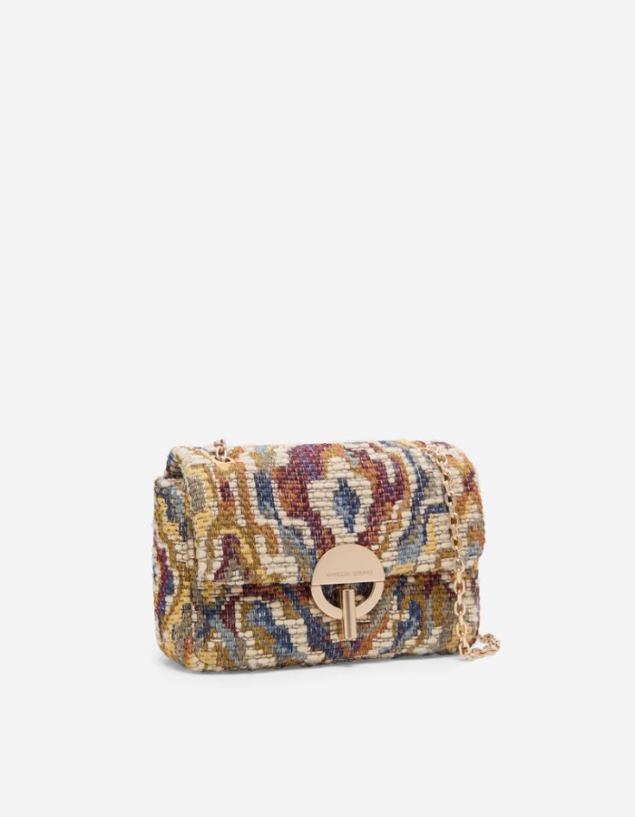 Moyen Sac Moon Vanessa Bruno en jacquard multicolore tissé, fermoir doré coulissant et chaîne.